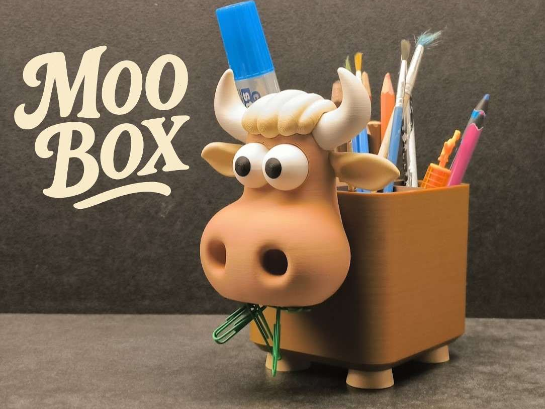 Moo Box pen holder on a desk